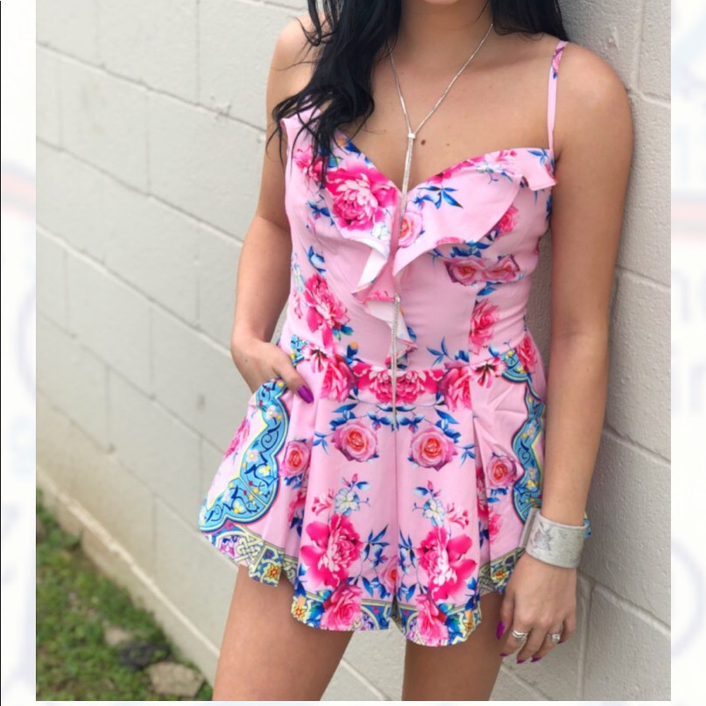 Romper. Brand new. Size medium. With tags
